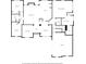 Detailed first floor plan showcasing layout of bedrooms, kitchen, living area, and garage at 1007 Fairway Seven, Villa Rica, GA 30180
