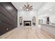 Spacious living room featuring a fireplace, hardwood flooring, and an open floorplan at 1007 Fairway Seven, Villa Rica, GA 30180