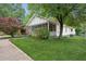 Charming home with a screened-in porch and well-maintained yard on a tree-lined street at 1792 Center Ave, East Point, GA 30344