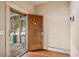 Entryway featuring hardwood floors and a wood door with diamond-shaped windows at 1792 Center Ave, East Point, GA 30344