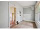 Bright room featuring two large windows and neutral walls leading to another room at 1792 Center Ave, East Point, GA 30344