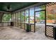 A spacious screened porch with street view, featuring an intricate lattice design at 1792 Center Ave, East Point, GA 30344