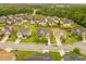 Neighborhood aerial showcasing lush greenery, well-maintained lawns, and tree-lined streets, creating a serene residential environment at 3039 Tuscan Ridge Dr, Snellville, GA 30039