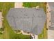 Aerial view of a well-maintained roof, mature trees, green grass, and landscaping at 3039 Tuscan Ridge Dr, Snellville, GA 30039