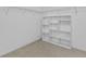 Walk-in closet featuring built-in shelving and wire racks for optimal storage at 3039 Tuscan Ridge Dr, Snellville, GA 30039
