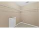 Walk-in closet features built-in shelving at 3039 Tuscan Ridge Dr, Snellville, GA 30039