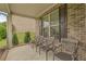 Inviting front porch featuring comfortable seating, perfect for enjoying the outdoors at 3039 Tuscan Ridge Dr, Snellville, GA 30039