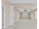 Large main bedroom featuring a tray ceiling with fan and neutral walls at 3039 Tuscan Ridge Dr, Snellville, GA 30039