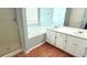 Bathroom features double sinks, a tub, and a separate shower stall at 5683 Isleworth Way, Atlanta, GA 30349