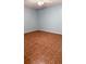 Spacious bedroom featuring durable tile flooring and a ceiling fan fixture at 5683 Isleworth Way, Atlanta, GA 30349
