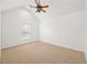 Bedroom with a ceiling fan and a large window at 5725 Lake Oak Lndg, Cumming, GA 30040