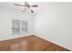 Bedroom featuring hardwood floors and overhead lighting at 5725 Lake Oak Lndg, Cumming, GA 30040