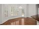 Bright breakfast nook featuring hardwood floors, bright lighting, and access to the deck at 5725 Lake Oak Lndg, Cumming, GA 30040