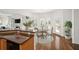 Breakfast nook off the kitchen features natural light and hardwood floors at 5725 Lake Oak Lndg, Cumming, GA 30040
