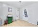 Bright bedroom with wood floor, white walls and trim, with two closets at 6057 Dorchester Dr, Rex, GA 30273