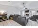 Spacious living room with tile flooring, fireplace, and plenty of natural light at 6057 Dorchester Dr, Rex, GA 30273