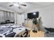 Main bedroom with ceiling fan and closet at 6057 Dorchester Dr, Rex, GA 30273