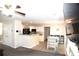 Kitchen area with an island open to an adjacent dining space at 1371 Blazing Star Rd, Lawrenceville, GA 30045