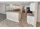Well-equipped kitchen featuring modern appliances and a breakfast bar at 1371 Blazing Star Rd, Lawrenceville, GA 30045