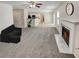 Inviting living room with fireplace, plush seating, and neutral décor at 1371 Blazing Star Rd, Lawrenceville, GA 30045