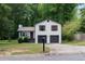 Charming home with a well-maintained lawn, two-car garage, and inviting curb appeal at 2442 Falcon Ct, Lawrenceville, GA 30043