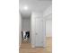 Hallway with hardwood floors, recessed lighting, and access to additional rooms and storage at 2442 Falcon Ct, Lawrenceville, GA 30043