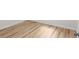 New hardwood flooring featured throughout the home in a light, natural finish at 2442 Falcon Ct, Lawrenceville, GA 30043