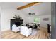 Bright and spacious living room with hardwood floors and stone fireplace at 2442 Falcon Ct, Lawrenceville, GA 30043