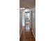Hallway with hardwood flooring leading to a bright room, and recessed lighting at 282 Ellesmere Court, Buford, GA 30518