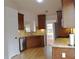 Modern kitchen featuring stainless steel appliances, granite countertops, and ample cabinet space at 282 Ellesmere Court, Buford, GA 30518