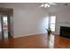 Spacious living room with hardwood floors and a fireplace at 282 Ellesmere Court, Buford, GA 30518