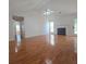 Spacious living room with hardwood floors, fireplace, and ceiling fan at 282 Ellesmere Court, Buford, GA 30518