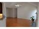Open-concept living room with hardwood floors, fireplace, and plenty of space for entertaining at 282 Ellesmere Court, Buford, GA 30518
