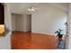 Bright and spacious living area with hardwood floors, natural light, and access to the kitchen at 282 Ellesmere Court, Buford, GA 30518