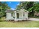 Quaint home with a welcoming front porch and swing, nestled in a green, leafy neighborhood at 376 Pine Ne St, Marietta, GA 30060