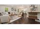 Spacious living area with hardwood floors, contemporary decor, and an open layout to the kitchen at 376 Pine Ne St, Marietta, GA 30060