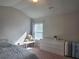 Bedroom featuring a vaulted ceiling, neutral color scheme, and an abundance of natural light at 2264 Shetley Creek Dr, Norcross, GA 30071