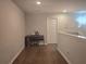 Upstairs hallway with hardwood floors leading to several rooms at 2264 Shetley Creek Dr, Norcross, GA 30071