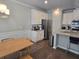 Modern kitchen featuring stainless steel appliances and granite countertops with seating at 2264 Shetley Creek Dr, Norcross, GA 30071