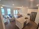Open living area connecting kitchen, living, and dining rooms at 2264 Shetley Creek Dr, Norcross, GA 30071