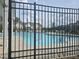 Community pool view with clear blue water and lounge chairs, perfect for relaxation and recreation at 2264 Shetley Creek Dr, Norcross, GA 30071