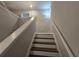 Staircase with natural light and neutral decor at 2264 Shetley Creek Dr, Norcross, GA 30071