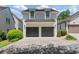 Charming two-story home with a two-car garage, set amidst a well-maintained community at 6715 Pond Rd, Cumming, GA 30040