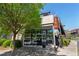 Restaurant front with large glass windows and outdoor patio seating, offering a bright and open dining experience at 6715 Pond Rd, Cumming, GA 30040