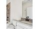 Bathroom featuring granite vanity, modern fixtures, and tiled shower with a tub at 101 Mission Se Way # 101, Atlanta, GA 30315