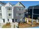 Beautiful new construction townhome with dark painted brick and numerous windows at 101 Mission Se Way # 101, Atlanta, GA 30315