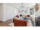 Inviting living room with a cozy seating arrangement, modern lighting, and hardwood floors at 101 Mission Se Way # 101, Atlanta, GA 30315