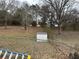 Expansive fenced backyard with a shed, offering plenty of space for outdoor activities and storage at 2195 Wilson Rd, Conyers, GA 30012