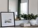 Stylish interior decor featuring a mirror, framed art, and decorative plants at 235 Ivey Ter, Temple, GA 30179