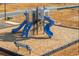 Community playground with slides, climbing areas, and a bench, creating a fun and safe space for children at 235 Ivey Ter, Temple, GA 30179